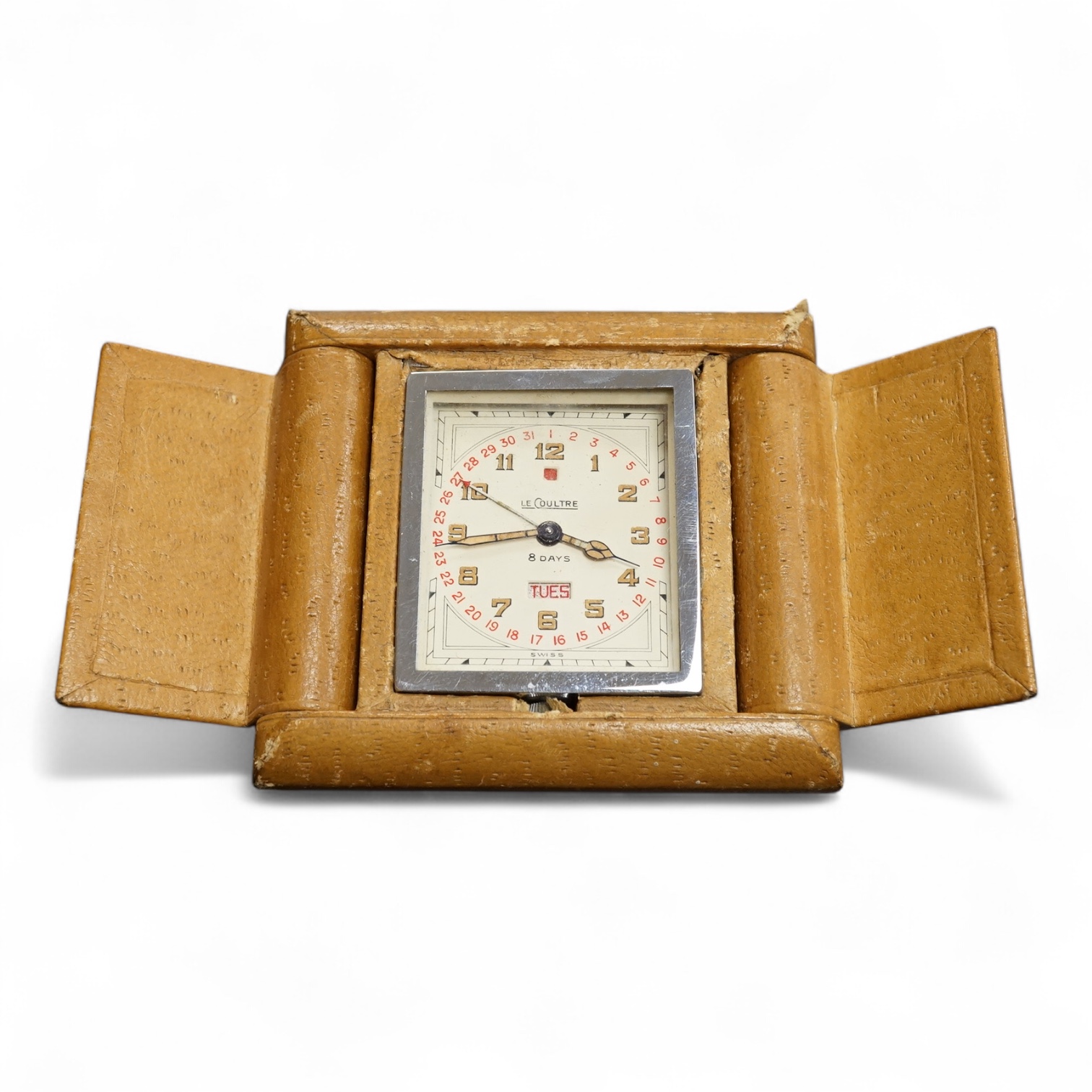 A leather cased chrome LeCoultre 8-day travelling timepiece, 9.5cm wide
